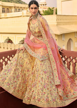 Laden Sie das Bild in den Galerie-Viewer, Daffodil Yellow Lehenga Choli with Zari, Dori,  Swarvoski, Thread &amp; Zarkan work