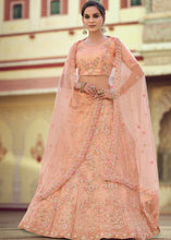 Laden Sie das Bild in den Galerie-Viewer, Salmon Orange Soft Net Lehenga Choli with Sequins, Thread, Zari &amp; Dori work