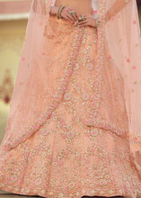 Laden Sie das Bild in den Galerie-Viewer, Salmon Orange Soft Net Lehenga Choli with Sequins, Thread, Zari &amp; Dori work