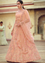 Laden Sie das Bild in den Galerie-Viewer, Salmon Orange Soft Net Lehenga Choli with Sequins, Thread, Zari &amp; Dori work