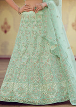 Laden Sie das Bild in den Galerie-Viewer, Mint Green Soft Net Lehenga Choli with Sequins, Thread, Zari &amp; Dori work