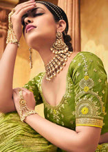 Load image into Gallery viewer, Avocado Green Banarasi Silk Lehenga Choli with Khatli work Embroidery