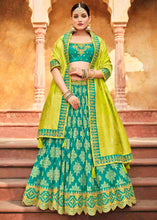 Load image into Gallery viewer, Turquoise Blue Banarasi Silk Lehenga Choli with Khatli work Embroidery