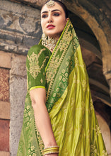 Load image into Gallery viewer, Shades Of Green Zari Woven Banarasi Silk Saree with Embroidered Blouse