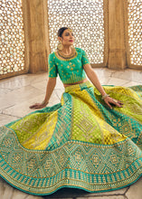Load image into Gallery viewer, Yellow &amp; Blue Banarasi Silk Lehenga Choli with Heavy Embroidery Work