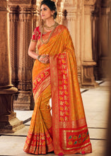 Laden Sie das Bild in den Galerie-Viewer, Amber Orange Woven Banarasi Silk Saree with Embroidered Blouse