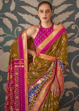 Load image into Gallery viewer, Green &amp; Pink Patola Silk Saree with Zari Border &amp; Tassels On Pallu