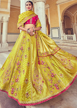 Load image into Gallery viewer, Cadmium Yellow Banarasi Silk Lehenga Choli with Khatli and Heavy Embroidered work