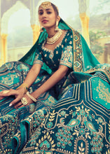 Laden Sie das Bild in den Galerie-Viewer, Shades Of Blue Banarasi Silk Lehenga Choli with Khatli and Heavy Embroidered work