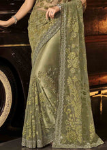 Load image into Gallery viewer, Mehendi Green Designer Net Saree with Jari, Mirror &amp; Moti Cut Dana work