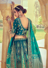 Laden Sie das Bild in den Galerie-Viewer, Shades Of Blue Banarasi Silk Lehenga Choli with Khatli and Heavy Embroidered work
