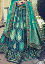 Laden Sie das Bild in den Galerie-Viewer, Shades Of Blue Banarasi Silk Lehenga Choli with Khatli and Heavy Embroidered work