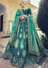 Laden Sie das Bild in den Galerie-Viewer, Shades Of Blue Banarasi Silk Lehenga Choli with Khatli and Heavy Embroidered work