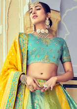 Laden Sie das Bild in den Galerie-Viewer, Blue &amp; Yellow Banarasi Silk Lehenga Choli with Khatli and Heavy Embroidered work