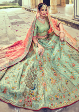 Load image into Gallery viewer, Pistachio Green Banarasi Silk Lehenga Choli with Khatli and Heavy Embroidered work