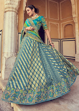 Laden Sie das Bild in den Galerie-Viewer, Blue &amp; Green Banarasi Silk Lehenga Choli with Khatli and Heavy Embroidered work