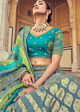 Laden Sie das Bild in den Galerie-Viewer, Blue &amp; Green Banarasi Silk Lehenga Choli with Khatli and Heavy Embroidered work
