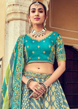 Laden Sie das Bild in den Galerie-Viewer, Blue &amp; Green Banarasi Silk Lehenga Choli with Khatli and Heavy Embroidered work