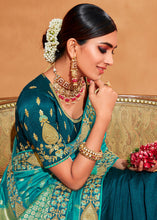 Load image into Gallery viewer, Shades Of Blue Heavy Embroidered Banarasi Silk Saree