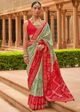 Load image into Gallery viewer, Green &amp; Red Printed Patola Silk Saree with Swaroski Work