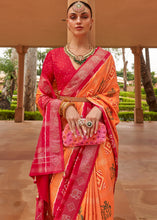 Load image into Gallery viewer, Tangerine Orange Printed Patola Silk Saree with Swaroski Work
