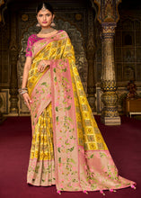 Load image into Gallery viewer, Cadmium Yellow Woven Patola Printed Dola Silk Saree with Heavy Embroidered Blouse