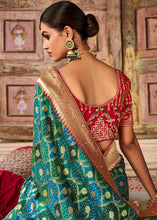 Load image into Gallery viewer, Blue &amp; Green Woven Patola Printed Dola Silk Saree with Heavy Embroidered Blouse