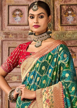 Load image into Gallery viewer, Blue &amp; Green Woven Patola Printed Dola Silk Saree with Heavy Embroidered Blouse