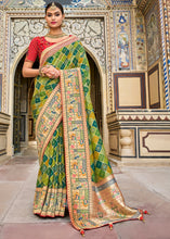 Load image into Gallery viewer, Shades Of Green Woven Patola Printed Dola Silk Saree with Heavy Embroidered Blouse