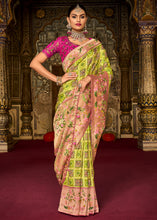 Load image into Gallery viewer, Chartreuse Green Woven Patola Printed Dola Silk Saree with Heavy Embroidered Blouse