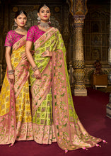 Load image into Gallery viewer, Chartreuse Green Woven Patola Printed Dola Silk Saree with Heavy Embroidered Blouse