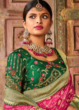 Load image into Gallery viewer, Hot Pink Woven Patola Printed Dola Silk Saree with Heavy Embroidered Blouse