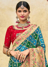 Load image into Gallery viewer, Blue &amp; Green Woven Patola Printed Dola Silk Saree with Heavy Embroidered Blouse