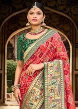 Load image into Gallery viewer, Shades Of Red Woven Patola Printed Dola Silk Saree with Heavy Embroidered Blouse