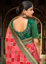 Load image into Gallery viewer, Shades Of Red Woven Patola Printed Dola Silk Saree with Heavy Embroidered Blouse