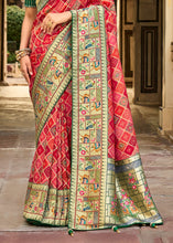Load image into Gallery viewer, Shades Of Red Woven Patola Printed Dola Silk Saree with Heavy Embroidered Blouse