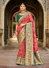 Load image into Gallery viewer, Shades Of Red Woven Patola Printed Dola Silk Saree with Heavy Embroidered Blouse
