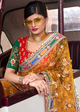 Load image into Gallery viewer, Mustard Yellow Digital Net Saree with Sequins,Thread,Mirror &amp; Flower Applic work