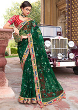 Load image into Gallery viewer, Bottle Green Digital Net Saree with Sequins,Thread,Mirror &amp; Flower Applic work