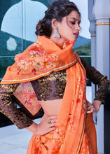 Load image into Gallery viewer, Amber Orange Floral Handprinted Organza Silk Saree