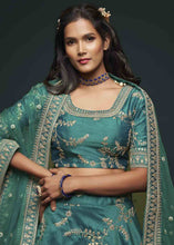 Load image into Gallery viewer, Teal Green Silk Lehenga Choli with Thread,Zari,Dori &amp; Sequins work