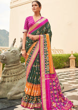 Load image into Gallery viewer, Green &amp; Pink Patola Silk Saree with Zari Border &amp; Tassels On Pallu