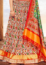 Load image into Gallery viewer, White &amp; Red Patola Printed Banarasi Silk Lehenga Choli with Embroidery Work