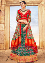 Cargar imagen en el visor de la galería, Green &amp; Red Patola Printed Banarasi Silk Lehenga Choli with Embroidery Work