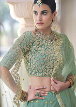Load image into Gallery viewer, Caribbean Green Soft Net Lehenga Choli with Dori &amp; Sequins work