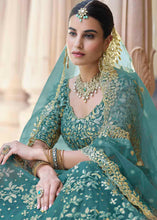 Load image into Gallery viewer, Rama Green Soft Net Lehenga Choli with Dori &amp; Sequins work