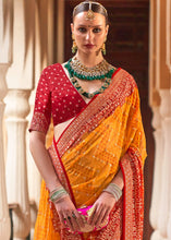 Cargar imagen en el visor de la galería, Saffron Yellow Leheriya Printed Georgette Saree with Gota Patti work