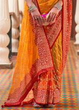 Cargar imagen en el visor de la galería, Saffron Yellow Leheriya Printed Georgette Saree with Gota Patti work