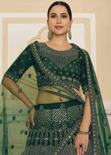 Load image into Gallery viewer, Bottle Green Soft Net Lehenga Choli with Dori &amp; Mirror work