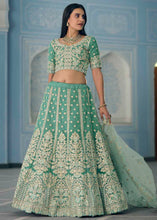 Load image into Gallery viewer, Turquoise Green Organza Lehenga Choli with Dori,Zari, Zarkan &amp; Sequins work